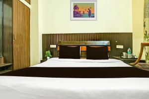 Ένα ή περισσότερα κρεβάτια σε δωμάτιο στο Hotel Kingston, Zirakpur