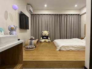 屋顶民宿 객실 침대