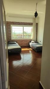 Katil atau katil-katil dalam bilik di Villa BleuBlanca Tangier