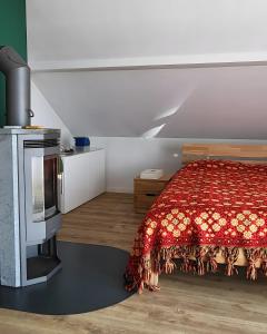 a bedroom with a bed and a tv at Apartment Zum Wohlfühlen in Sulz am Neckar
