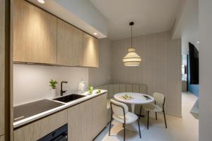 Cucina o angolo cottura di Ambasciatori Suite Hotel