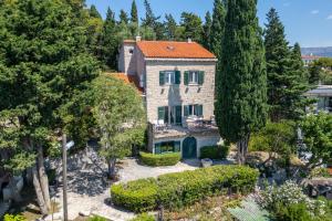 an aerial view of a house with trees at Villa Mediteran in Split