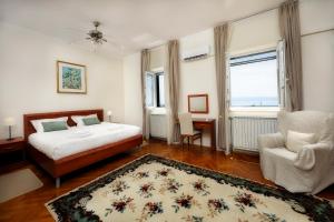 Llit o llits en una habitació de Villa Mediteran