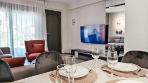 Μια τηλεόραση ή/και κέντρο ψυχαγωγίας στο Windfall Luxury House