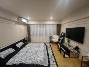 屋顶民宿 TV 또는 엔터테인먼트 센터