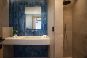 Ванная комната в Este Elegant Suites & Villas +67 фотографий