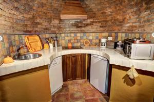 A kitchen or kitchenette at Sabina