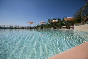 The swimming pool at or close to Spa Resort Fonte Alla Lepre