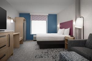 Home2 Suites By Hilton Columbus Easton客房内的一张或多张床位