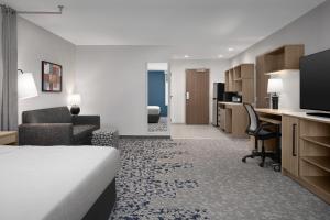 Home2 Suites By Hilton Columbus Easton客房内的一张或多张床位