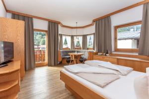 Voodi või voodid majutusasutuse Apart-Hotel Forellenhof toas