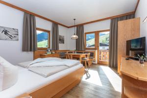 Voodi või voodid majutusasutuse Apart-Hotel Forellenhof toas