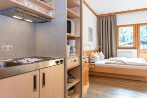 Voodi või voodid majutusasutuse Apart-Hotel Forellenhof toas