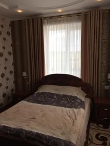 Postel nebo postele na pokoji v ubytování Hotel Oktan