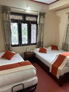 Katil atau katil-katil dalam bilik di Hotel Beijing Lu