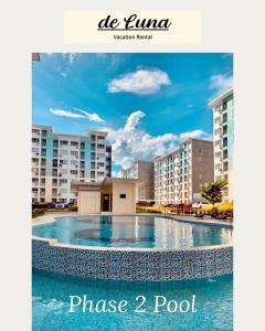 a picture of a pool in front of some buildings at de Luna Vacation Rental in Davao City