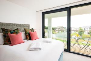 Voodi või voodid majutusasutuse Lazy Days BR07 Silverlake Dorset toas