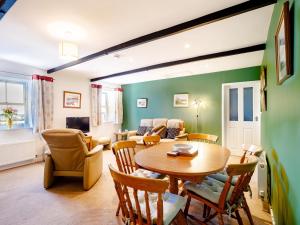 Et opholdsområde på Dovecoat Cottage