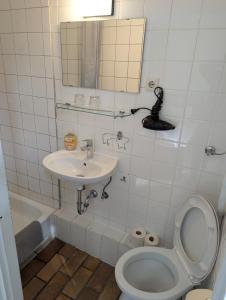 Koupelna v ubytování Hotel Pension Waizenegger am Kurfürstendamm