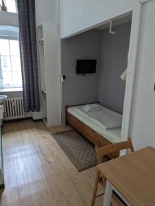 Postel nebo postele na pokoji v ubytování Hotel Pension Waizenegger am Kurfürstendamm
