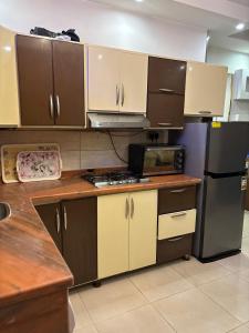 Eldhús eða eldhúskrókur á Long Island روميل