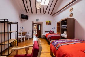 Postel nebo postele na pokoji v ubytování Tucan Hostel + 37 fotografií