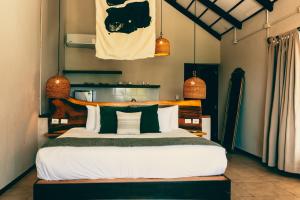 Cama o camas de una habitación en Mia Tulum Beachfront Resort - Ocean View Suites and Beach Club