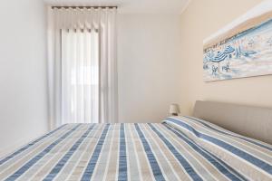 Ένα ή περισσότερα κρεβάτια σε δωμάτιο στο Raksha House by BarbarHouse