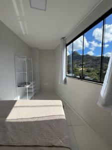 Nespecifikovaný výhled na hory nebo výhled na hory při pohledu z apartmánu