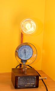 a clock sitting on top of a wooden box at chambresdusoleil in Hoffen