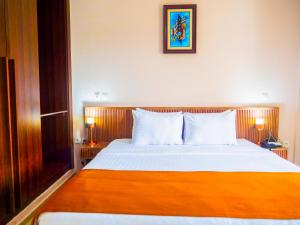 Postel nebo postele na pokoji v ubytování Hôtel KEMAKA + 21 fotografií