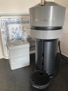 a coffee maker sitting on top of a counter at The Old Stable, Llancarfan in Llancarvan +15 photos