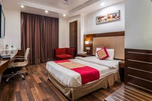 Postel nebo postele na pokoji v ubytování Hotel Le Roi Near New Delhi Railway Station
