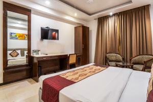 Postel nebo postele na pokoji v ubytování Hotel Le Roi Near New Delhi Railway Station