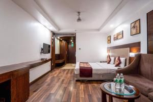 Postel nebo postele na pokoji v ubytování Hotel Le Roi Near New Delhi Railway Station