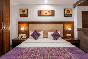 Postel nebo postele na pokoji v ubytování Hotel Le Roi Near New Delhi Railway Station