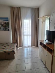 Μια τηλεόραση ή/και κέντρο ψυχαγωγίας στο Apartments M