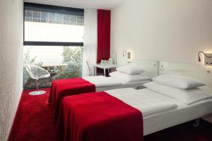 Posteľ alebo postele v izbe v ubytovaní Metropol Design Hotel Old Town