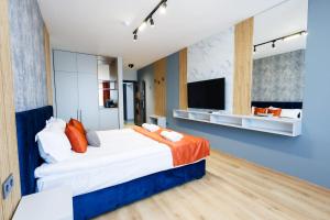 Postel nebo postele na pokoji v ubytování Boulevard Hotel