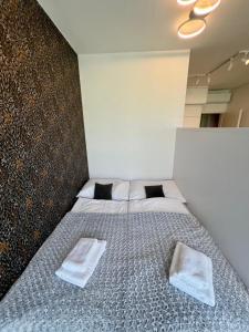 Postel nebo postele na pokoji v ubytování Harmony Apartment Znojmo