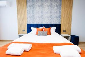 Postel nebo postele na pokoji v ubytování Boulevard Hotel