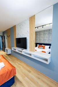 Postel nebo postele na pokoji v ubytování Boulevard Hotel