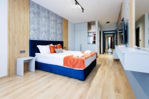 Postel nebo postele na pokoji v ubytování Boulevard Hotel