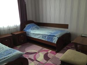 Postel nebo postele na pokoji v ubytování Hotel Oktan