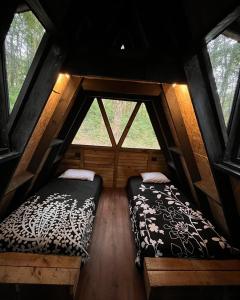 Postel nebo postele na pokoji v ubytování Cabaña de los Titos