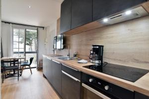 Kuchyň nebo kuchyňský kout v ubytování Julie 15 - A 200m de la plage + 6 fotografií