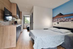 Postel nebo postele na pokoji v ubytování Julie 15 - A 200m de la plage