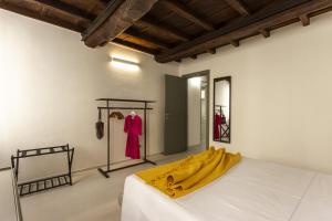 En eller flere senge i et værelse på Salvia Suite - Smart Holiday