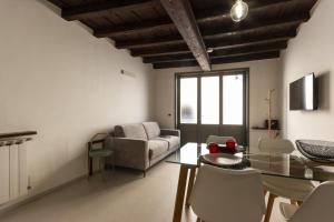 Et opholdsområde på Salvia Suite - Smart Holiday