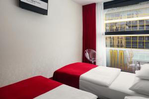 Posteľ alebo postele v izbe v ubytovaní Metropol Design Hotel Old Town